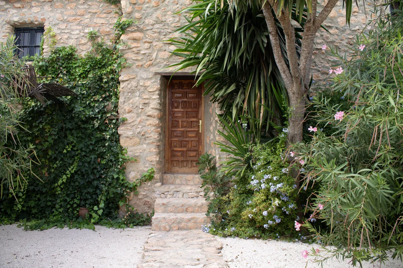 A doorway opening onto the gardens at Sierra Recovery.